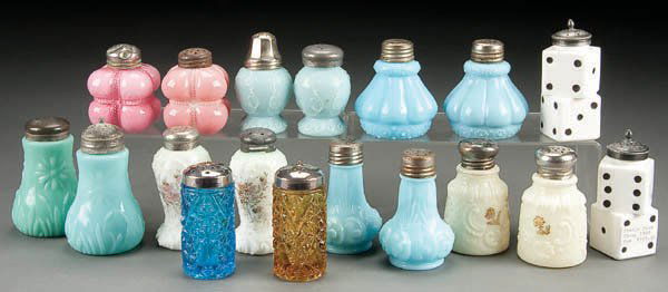 NINE VICTORIAN PATTERN GLASS SHAKER SETS, circa: NINE VICTORIAN PATTERN GLASS SHAKER SETS, circa 1900, in various colors including Northwood Louis XV custard, double dice, Wavecrest and other varieties, the largest 4 inches. Estimate $100-$200