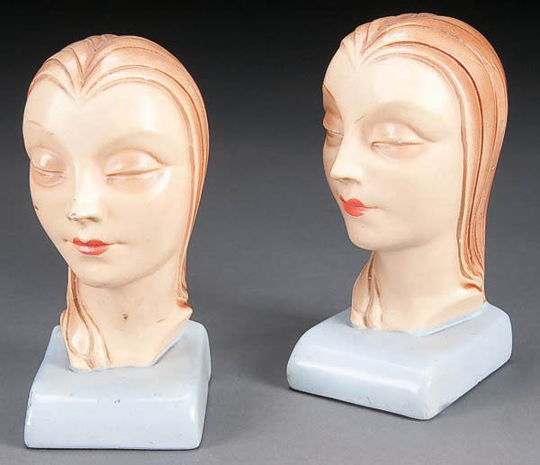 A PAIR OF ART DECO BOOKENDS, mid 20th century, of: A PAIR OF ART DECO BOOKENDS, mid 20th century, of a young beauty, composition with painted features, height 7 inches. Estimate $40-$80