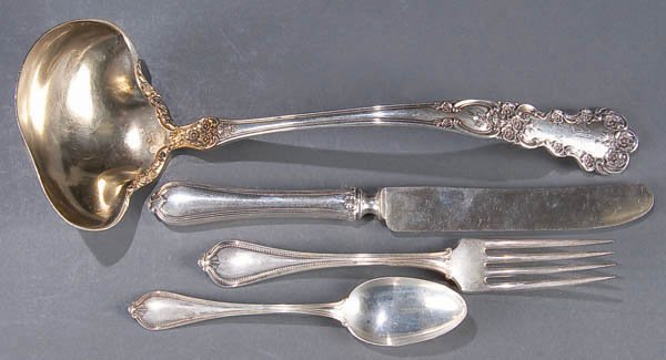 A TOWLE ''OLD NEWBURY'' STERLING FLATWARE SET ear: A TOWLE ''OLD NEWBURY'' STERLING FLATWARE SET early 20th century, 3 piece service for 6 together with a Gorham punch ladle (length 10.5 inches), 6 sterling demitasse spoons and over 30 pieces of assor