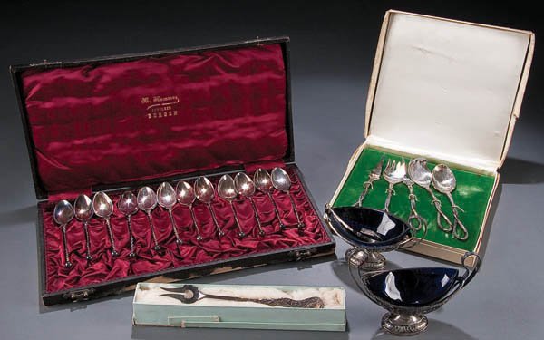 A STERLING DEMITASSE SPOON SET late 19th century,: A STERLING DEMITASSE SPOON SET late 19th century, 12 pieces contained in a fitted case. Together with a 5-piece condiment set, pickle fork, tongs, and two 19th century salt cellars with cobalt insert 
