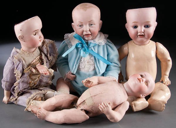 FOUR GERMAN BISQUE DOLLS including a Flora Dora a: FOUR GERMAN BISQUE DOLLS including a Flora Dora and kaiser style baby, various marks including A & M and K Star R. 11 to 15 inches. Estimate $150-$250