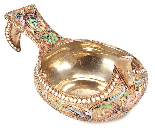A RUSSIAN SILVER-GILT AND ENAMEL KOVSH: A RUSSIAN SILVER-GILT AND SHADED ENAMEL KOVSH, MOSCOW 1899-1908. The body and hook handled enameled with florals on a stippled gilt ground, the base and rim with white beaded enameling. Hallmarked Mos