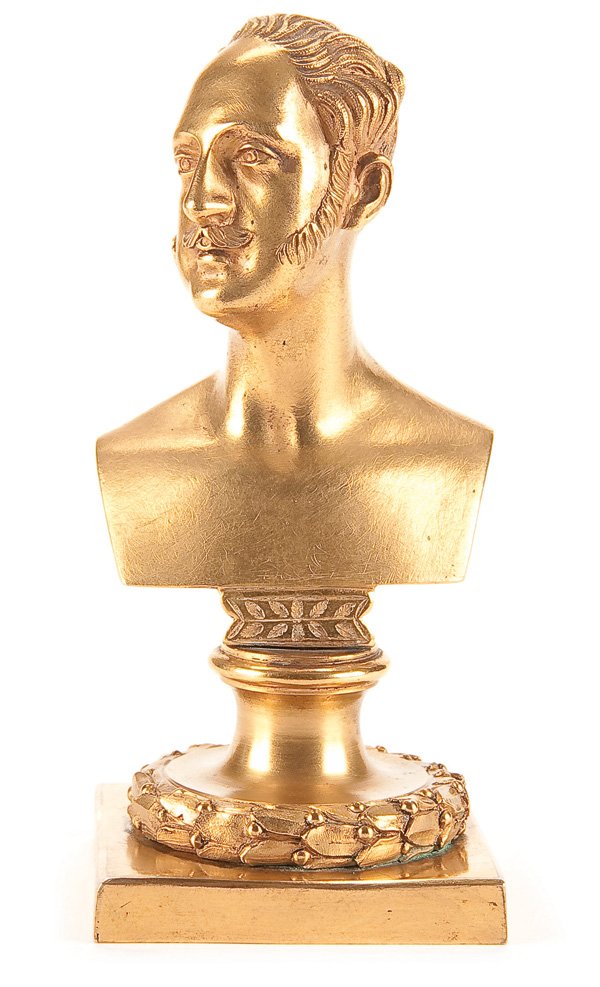 A GILT-BRONZE BUST OF TSAR NICHOLAS I, CIRCA 1850: A GILT-BRONZE BUST OF TSAR NICHOLAS I, CIRCA 1850. Finely sculpted, the hair with stippled chasing, resting on a conical plinth with laurel wreath base. Height 5.8 inches (15cm). Estimate $800-$1,200 