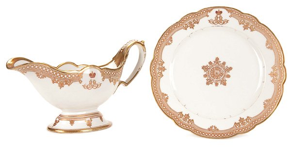 IMPERIAL PORCELAIN FACTORY DINNERWARE: TWO PIECES OF IMPERIAL PORCELAIN FACTORY DINNERWARE comprising a gravy boat and plate, from the Banquet Service of Tsarevitch Alexander Alexandrovich (later Alexander III). With scalloped edges and or