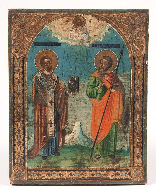 A RUSSIAN ICON OF ST. NICHOLAS & JOHN THE WARRIOR: A RUSSIAN ICON OF ST. NICHOLAS AND JOHN THE WARRIOR, CIRCA 1890. 8.5 inches x 7 inches (21.8 x 17.5 cm). Estimate $200-$300 Euro 100-200