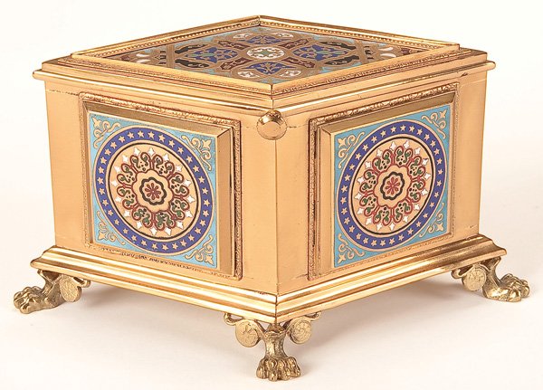 A FRENCH NAPOLEON III ENAMELED BRONZE CASKET: A FRENCH NAPOLEON III ENAMELED BRONZE CASKET, 19TH CENTURY. Of diamond form raised on claw feet with raised panels enameled with abstract rosettes. Length 8 inches (20 cm) Estimate $600-$900 Euro 400-