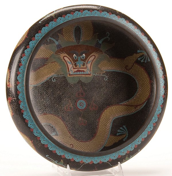 A CHINESE CLOISONNE ENAMELED BRONZE LOW BOWL: A CHINESE CLOISONNE ENAMELED BRONZE LOW BOWL, EARLY 20TH CENTURY. Very finely packed cloisons depicting a five toed yellow dragon on a scrolling diaper ground. Archaic Ming style mark on base. Diamete