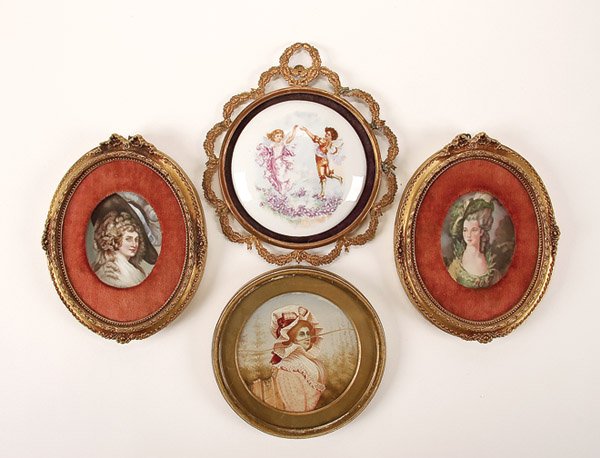 A GROUP OF PORTRAIT MINIATURES: A GROUP OF PORTRAIT MINIATURES AND DECORATED PORCELAIN PLAQUE GROUP Comprising a large circular ivory panel painted with a waist-up image of a bonneted red-haired woman, signed 'E. Landral?' and dated