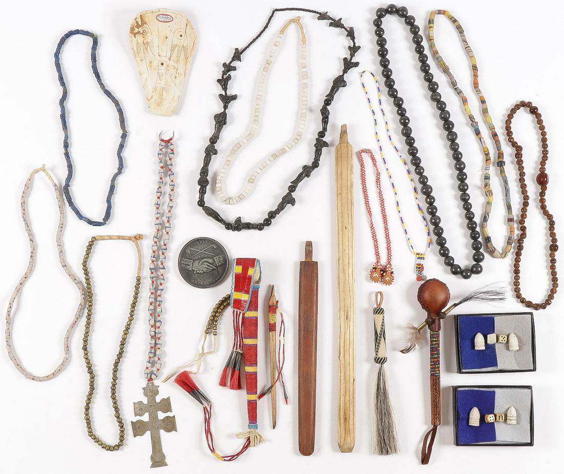 GOOD GROUP NATIVE AMERICAN RELATED MATERIAL: GOOD GROUP NATIVE AMERICAN RELATED MATERIAL. Comprising a variety of items including a very finely crafted quill decorated hide awl case with horsehair cone drops, a beaded rattle, a trade bead neckla