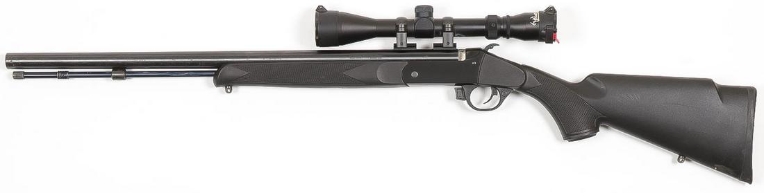 GOOD BLACK POWDER DEER GUN: GOOD BLACK POWDER DEER GUN. Comprising a Buckstalker .50 CAL black powder rifle, 24-inch barrel, mounted with a Traditions 3-9 x 40 adjustable scope. Overall length 40 inches. SN 14-13-021483-14. SHIP