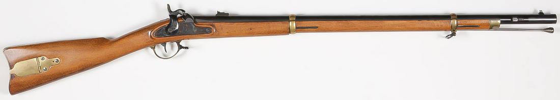 ZOUAVE .58 CAL PERCUSSION: ZOUAVE .58 CAL PERCUSSION. Comprising an Antonio Zoli Italian made replica of the ever popular 1863 Zouave rifle. Side of front barrel with bayonet lug. SN 8936. SHIPPING NOTICE: Jackson's is your sol