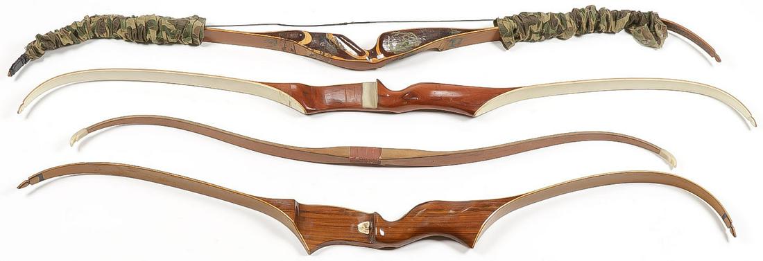 4 VINTAGE RECURVE BOWS: 4 VINTAGE RECURVE BOWS. From left to right they are a 59-inch Herter's, a 59-inch Ben Pearson Colt model 707, an unmarked laminated 48-inch bow, and a 55-inch Herter's.SHIPPING NOTICE:Jackson's is y