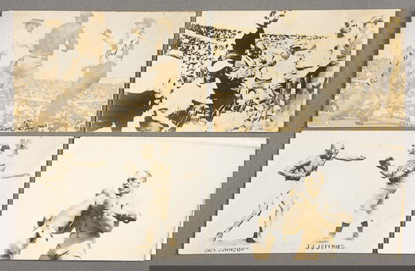 BLACK MEMORABILIA: BOXING REAL PHOTO POSTCARDS: FOUR JACK JOHNSON BOXING REAL PHOTO POSTCARDS circa 1910. All depicting the Johnson-Jeffries fight 1910. Including Sommer Studio backstamp, one postally used and inscribed "Knock Out of Jeffries" on v