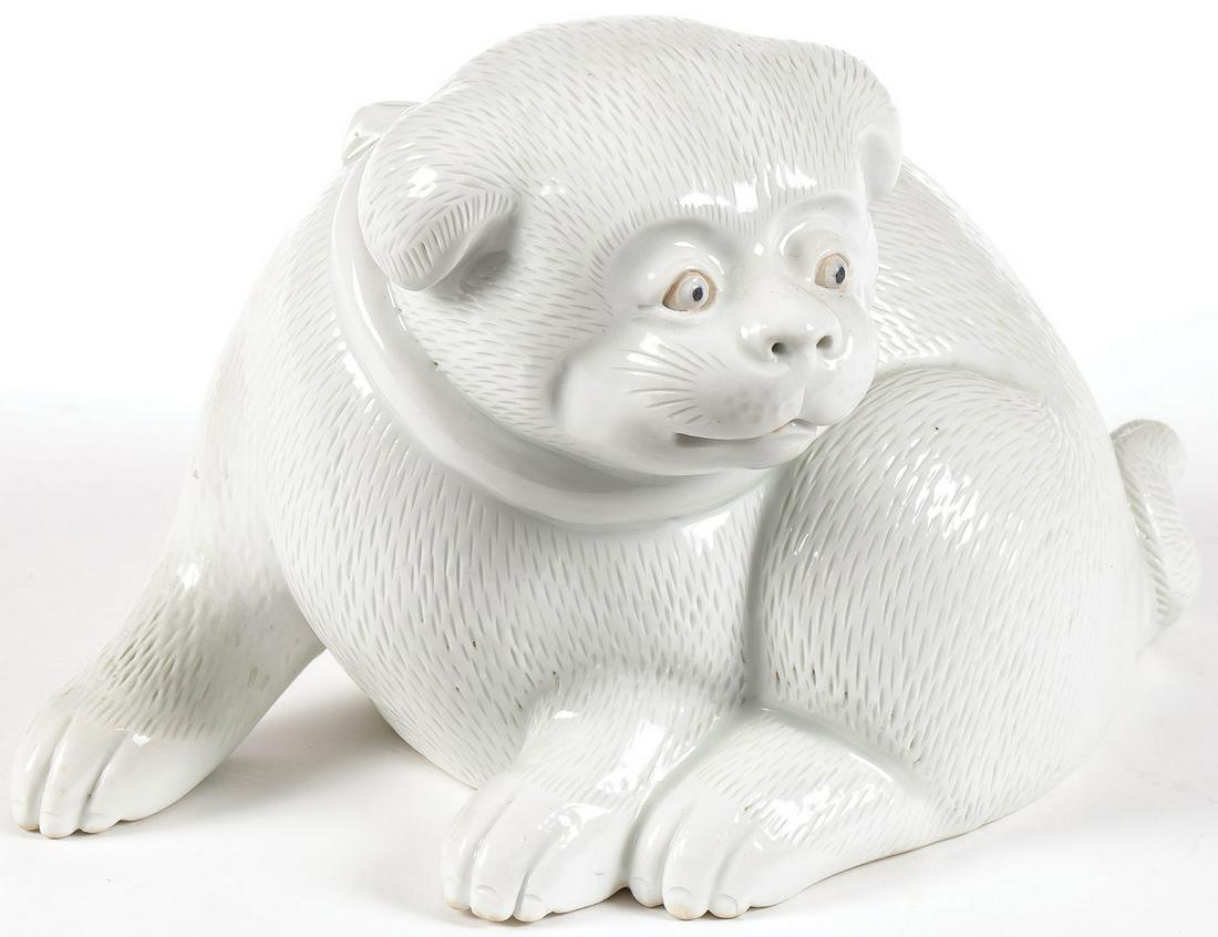 A JAPANESE HIRADO PORCELAIN DOG: A JAPANESE HIRADO PORCELAIN DOG. Finely modeled with ribbon on neck and overall with incised fur, possibly Edo. Height 4.75 inches (11.7 cm). SHIPPING NOTICE: Jackson's is your sole and only source fo