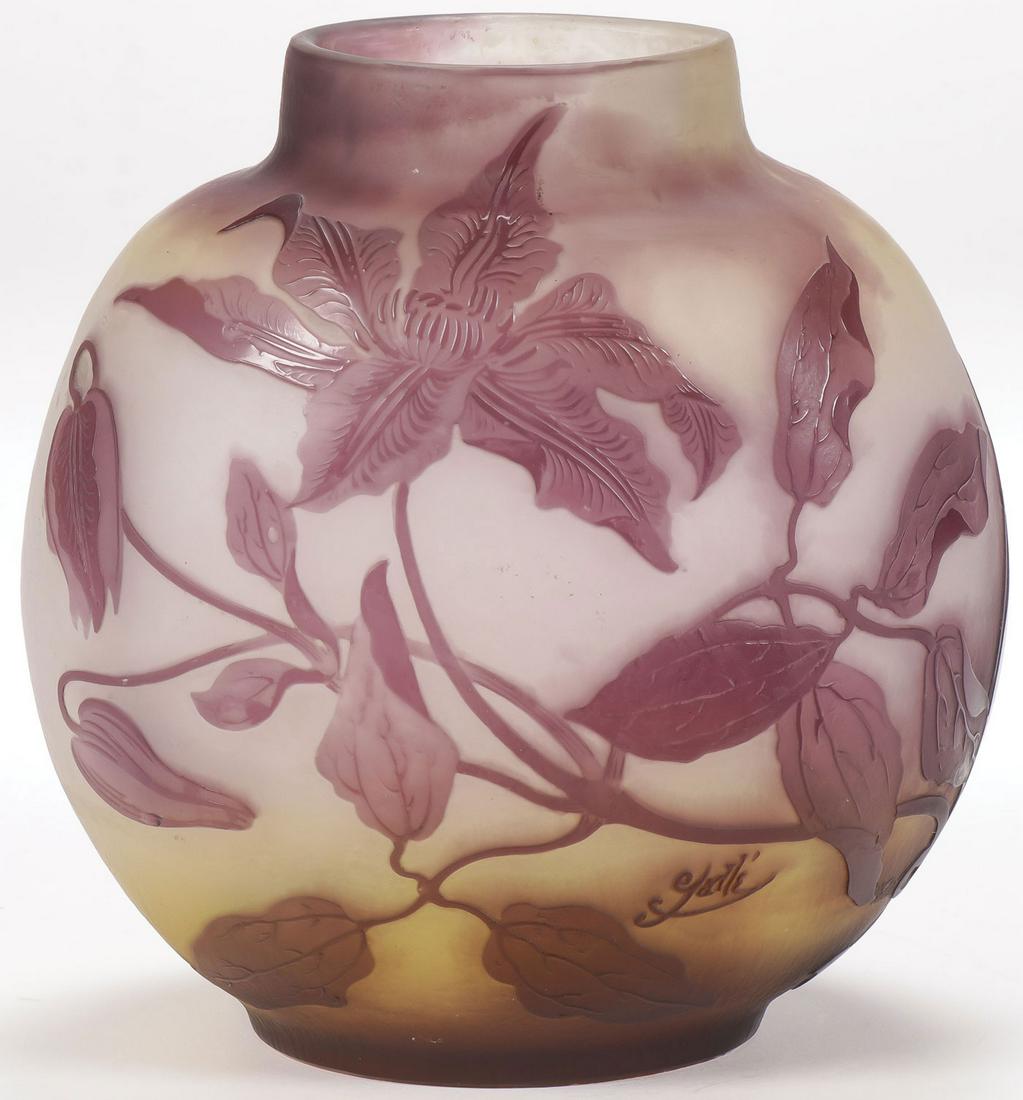 GALLE FRENCH CAMEO GLASS VASE, C. 1910: GALLE FRENCH CAMEO GLASS VASE, C. 1910. Ovoid form in yellow and frost decorated with a random purple flowering vine, signed in cameo Galle. Height 8.75 inches, diameter 7.5 inches. SHIPPING NOTICE:
