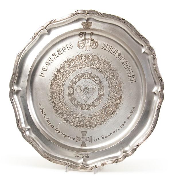 RUSSIAN FABERGE SILVER SALVER: A FINE AND IMPORTANT FABERGE SILVER PRESENTATION SALVER, MOSCOW CIRCA 1900. The imposing platter with scalloped rim and edged with reeded ribbon-tied border. The cavetto engraved with the Imperial D