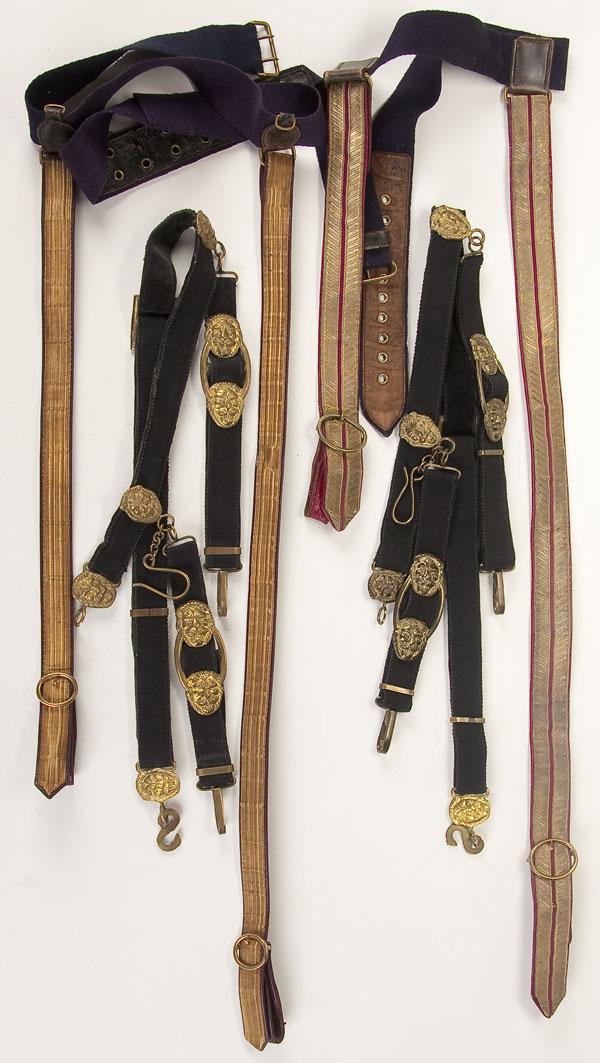 FOUR EUROPEAN OFFICER'S SWORD BELTS: A LOT OF FOUR EUROPEAN OFFICER'S SWORD BELTS, circa 1900. All are of the style generally worn under the uniform coat. Includes two examples with web belt and gold bullion hangers red leather. The othe