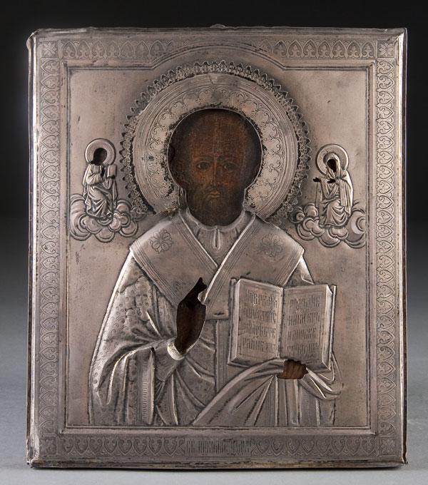 RUSSIAN ICON: ST. NICHOLAS: A RUSSIAN ICON OF ST. NICHOLAS, 19TH CENTURY. Overlaid with a machine engraved silver riza, hallmarked Moscow circa 1899-1908, 84 standard and indistinguishable maker's mark. 13.5 inches x 12.75 inche