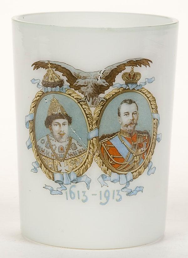 IMPERIAL RUSSIAN COMMEMORATIVE BEAKER: AN IMPERIAL RUSSIAN OPAQUE GLASS COMMEMORATIVE BEAKER commemorating the Romanov Tricentenary. The front depicting a double portrait of Tsar Mikhail Romanov (1613) and Tsar Nicholas II (1913). The vers