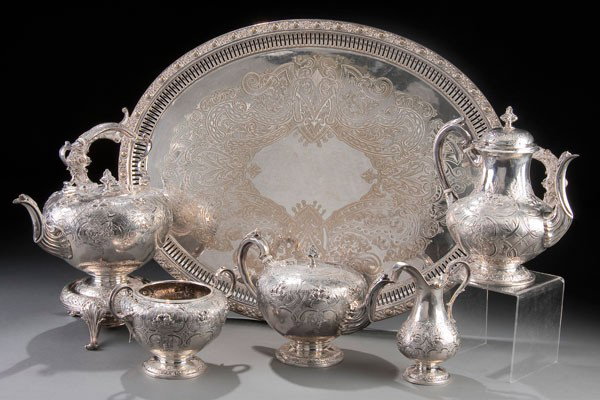 ENGLISH SILVER COFFEE/TEA SERVICE: AN ENGLISH VICTORIAN SILVER COFFEE/TEA SERVICE, Marshall & Sons, 1853-1854 Edinburgh. Five pieces comprising an 8 inch hot water pot, 9.5 inch coffeepot, 6.5 inch teapot, warming stand, sugar bowl and