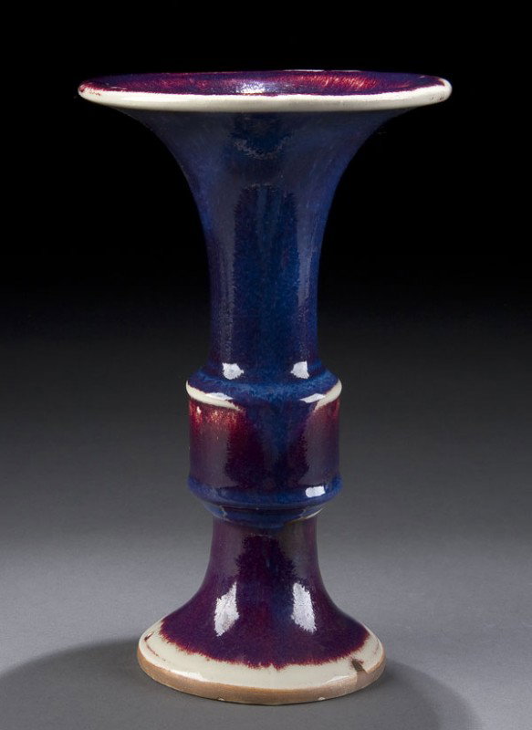 CHINESE FLAMBE BEAKER/VASE: A CHINESE FLAMBE BEAKER/VASE height 9.25 inches.