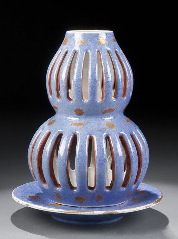 CHINESE QIANLONG RETICULATED GLAZED LANTERN: A CHINESE QIANLONG PERIOD RETICULATED BLUE GLAZED LANTERN with sgraffito foliate decoration and gilt bats and Taoist symbols. Some early repairs. Seal mark on base. Height 11 inches.