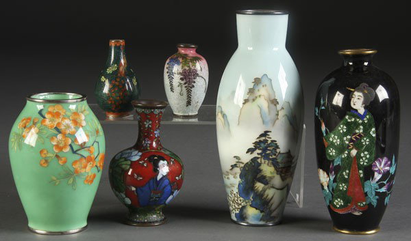 6 PC JAPANESE CLOISONNE ENAMELED VASE GROUP: A 6-PIECE JAPANESE CLOISONNE ENAMELED VASE GROUP early to mid 20th century. Including a silver mounted mountain scene, height 7.25 inches; a figural Geisha; and an Ando style.
