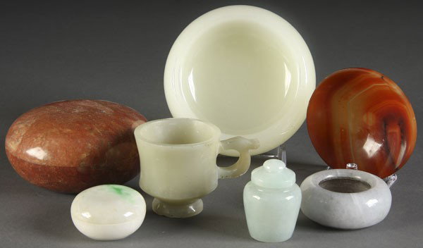 7 PC CHINESE JADE & HARDSTONE DECORATIVE ARTS: A 7-PIECE CHINESE JADE, AGATE & HARDSTONE DECORATIVE ARTS GROUP consisting of a jadeite lidded pill box, a white jade inkwell, a celadon jade lidded miniature vase, a white jade handled cup, a carved 
