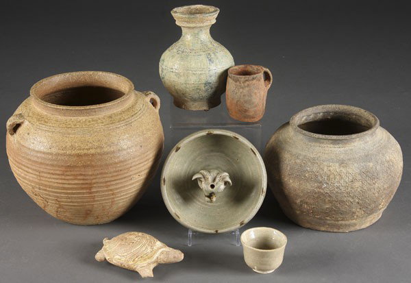 7 PC GROUP OF ASIAN ANCIENT STYLE CERAMICS: A 7-PIECE GROUP OF ASIAN ANCIENT STYLE CERAMICS consisting of a 7.5 inch handled jar, a glazed bowl with ram's head, handled mug, cup, turtle figure and other items.