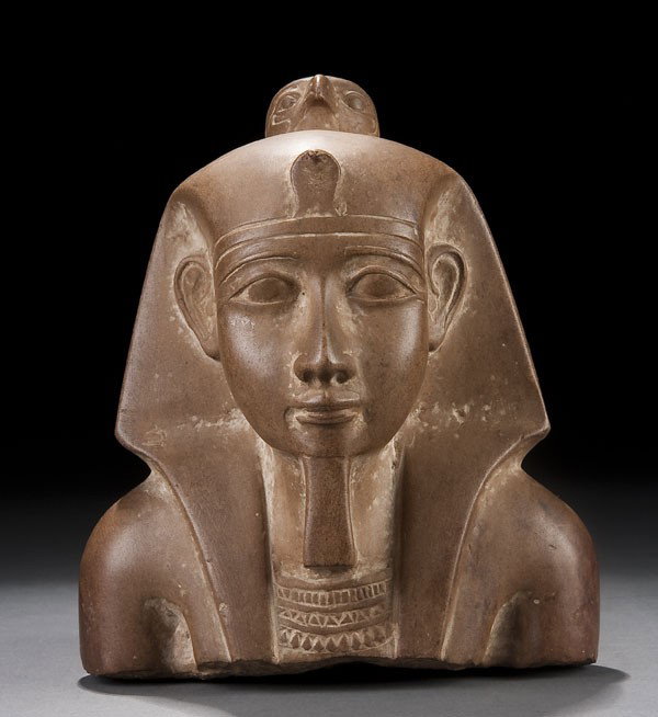 EGYPTIAN CARVED LIMESONE BUST OF A PHARAOH: AN EGYPTIAN CARVED LIMESTONE BUST OF A PHARAOH, possibly ancient. Height 7.25 inches.