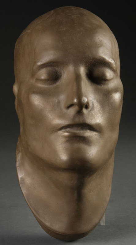NAPOLEON CAST COMPOSITION DEATH MASK: A NAPOLEON CAST COMPOSITION DEATH MASK with faux bronze finish. Height 13 inches.