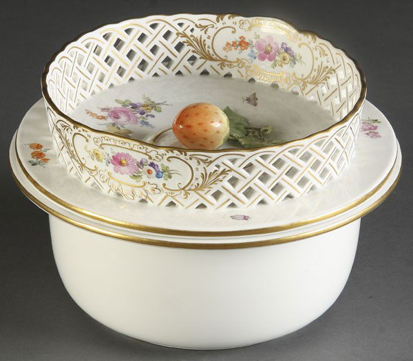MEISSEN HAND PAINTED FRUIT COOLER: A VERY FINE MEISSEN HAND PAINTED FRUIT COOLER with floral decorated and reticulated lid with figural strawberry handle. Crossed blue pommeled sword mark. Diameter 8.5 inches.