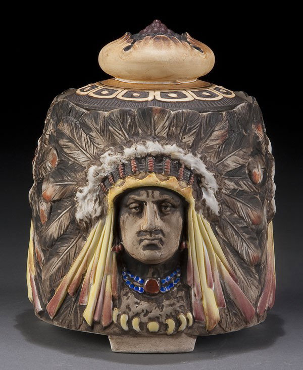 HAND PAINTED NIPPOIN CHIEF HUMIDOR: A RARE HAND PAINTED NIPPON CHIEF IN HEADDRESS MOLDED IN RELIEF HUMIDOR early 20th century. With hand painted decoration and three sculpted profiles. Green M in wreath mark. Height 6.75 inches.