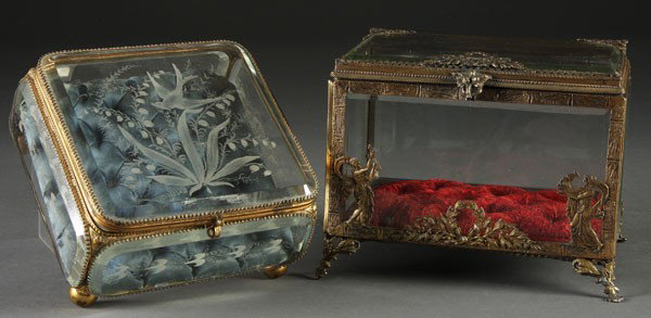 PR VICTORIAN GILT BRONZE DRESSER BOXES: A PAIR OF VICTORIAN GILT BRONZE & CRYSTAL DRESSER BOXES comprising an ormolu mounted and beveled panel crystal box with wheel engraved bird and floral decoration; and a gilt bronze beveled crystal cas