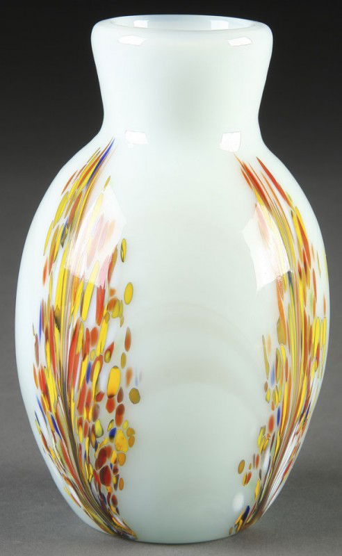 DOMINIC LABINO ART GLASS VASE: A DOMINIC LABINO ART GLASS VASE 1973. With multicolored spatter glass blooms on opaque ground. Inscribed and dated on pontil. Height 6 inches.