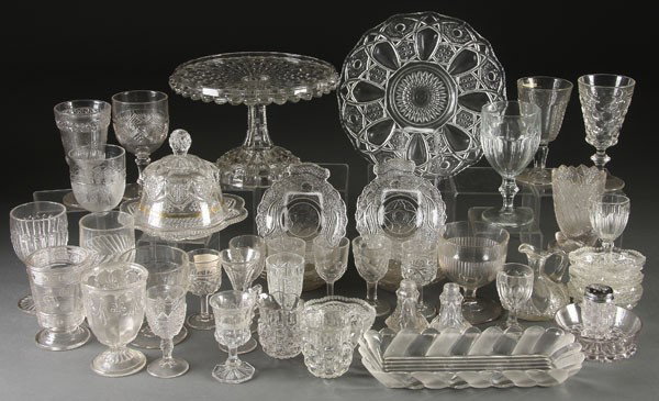 50 PCS OF EARLY AMERICAN PATTERN GLASS: A LARGE 50-PIECE GROUP OF EARLY AMERICAN PATTERN GLASS last quarter 19th century. In various patterns including Rosette, Fleur de Lis, Drapery, Frosted Ribbon and others. Comprising mostly stemmed win