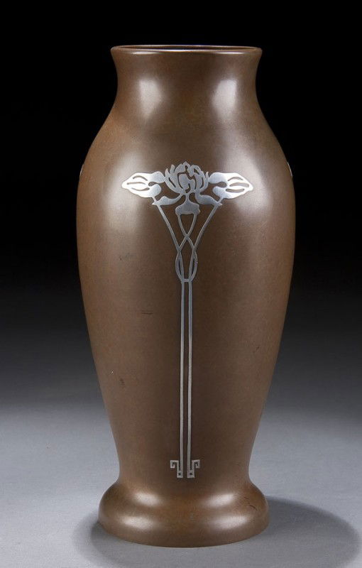 LARGE SILVERCREST BRONZE VASE: A LARGE SILVERCREST BRONZE VASE, early 20th century, with sterling stylized applied florals on a bronze baluster form, impressed mark and shape #1025. Height 12 inches.
