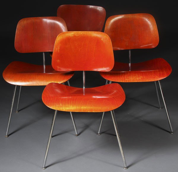 4 CHARLES EAMES DCM CHAIRS: A SET OF 4 CHARLES EAMES FOR HERMANN MILLER DCM CHAIRS mid 20th century, with original mahogany stained finish and chromed metal legs. 29 x 19 x 18 inches.