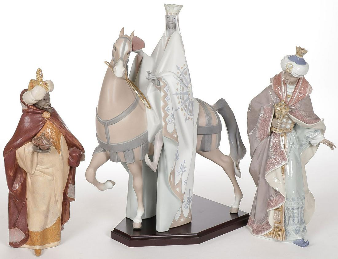 THREE LLADRO WISEMEN: THREE LLADRO WISEMEN. Including a large King Balthasar on a horseback #11020, with wood base, height 16 inches, and two others as shown. SHIPPING NOTICE: Jackson's is your sole and only source for on
