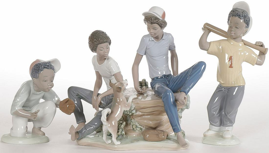 THREE LLADRO BLACK LEGACY FIGURES: THREE LLADRO BLACK LEGACY FIGURES. Each modeled as charming young boys in different poses and costumes. Greatest height 9 inches. Includes original box for the figure on the left. SHIPPING NOTICE: J