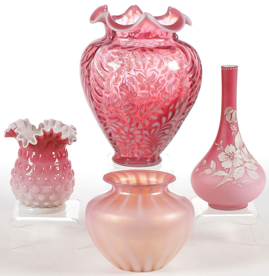 CRANBERRY ART GLASS GROUP: CRANBERRY ART GLASS GROUP. Comprising four individual pieces, including a large Fenton marked daisy and fern cranberry and opalescent vase with ruffled rim, as well as a probably Webb Hobnail peachblo
