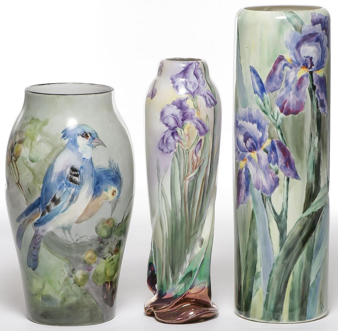THREE SPECTACULAR HAND-PAINTED VASES: THREE SPECTACULAR HAND-PAINTED VASES. Comprising three hand-painted porcelain vases. The first featuring blue jays amongst berry bush, underside marked T&V Limoges France. The second a molded organic 
