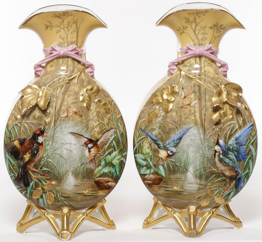 PAIR SPECTACULAR HAND-PAINTED FRENCH VASES 19TH C: PAIR SPECTACULAR HAND-PAINTED FRENCH VASES 19TH C. Comprising a pair of moon flask style vases on open work gilt bamboo feet with raised decoration and depicting finely painted song birds amongst wate