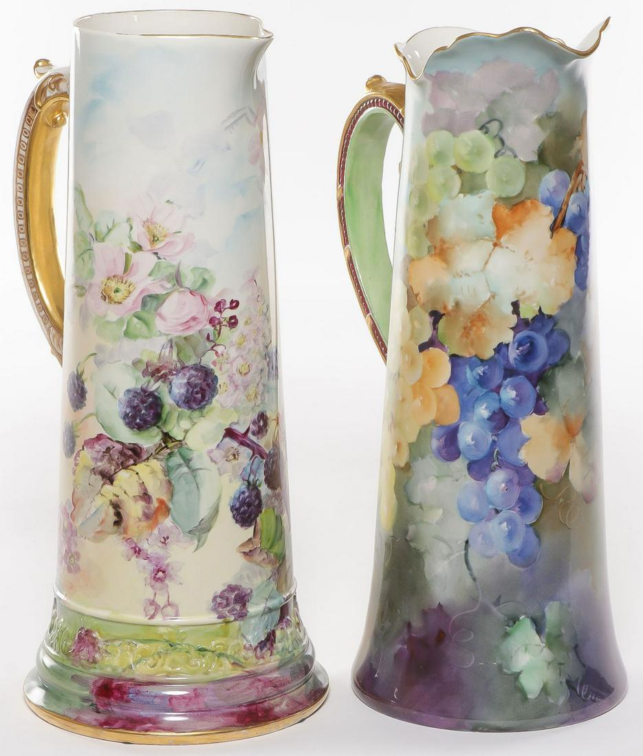PAIR BELLEEK HAND-PAINTED TANKARDS: PAIR BELLEEK HAND-PAINTED TANKARDS. Comprising two finely painted porcelain tankards one with blackberries or mulberries (on a luster ground) underside with CAC Belleek mark, the other finely painted