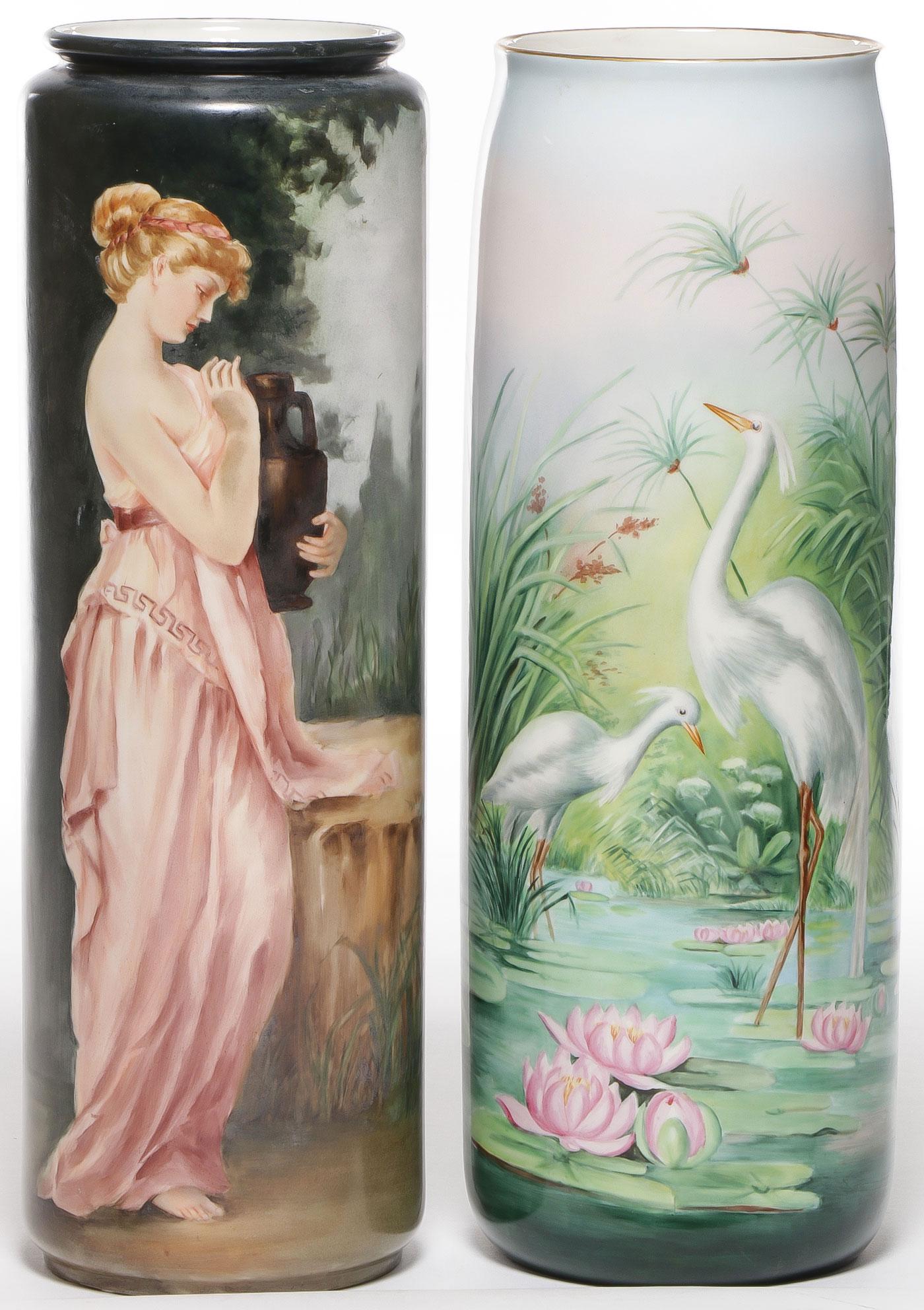 PAIR BELLEEK HAND-PAINTED VASES C. 1900: PAIR BELLEEK HAND-PAINTED VASES C. 1900. Comprising a pair of large and impressive cylindrical vases one finely painted with a Grecian woman holding urn in a wooded landscape underside with Belleek Wi