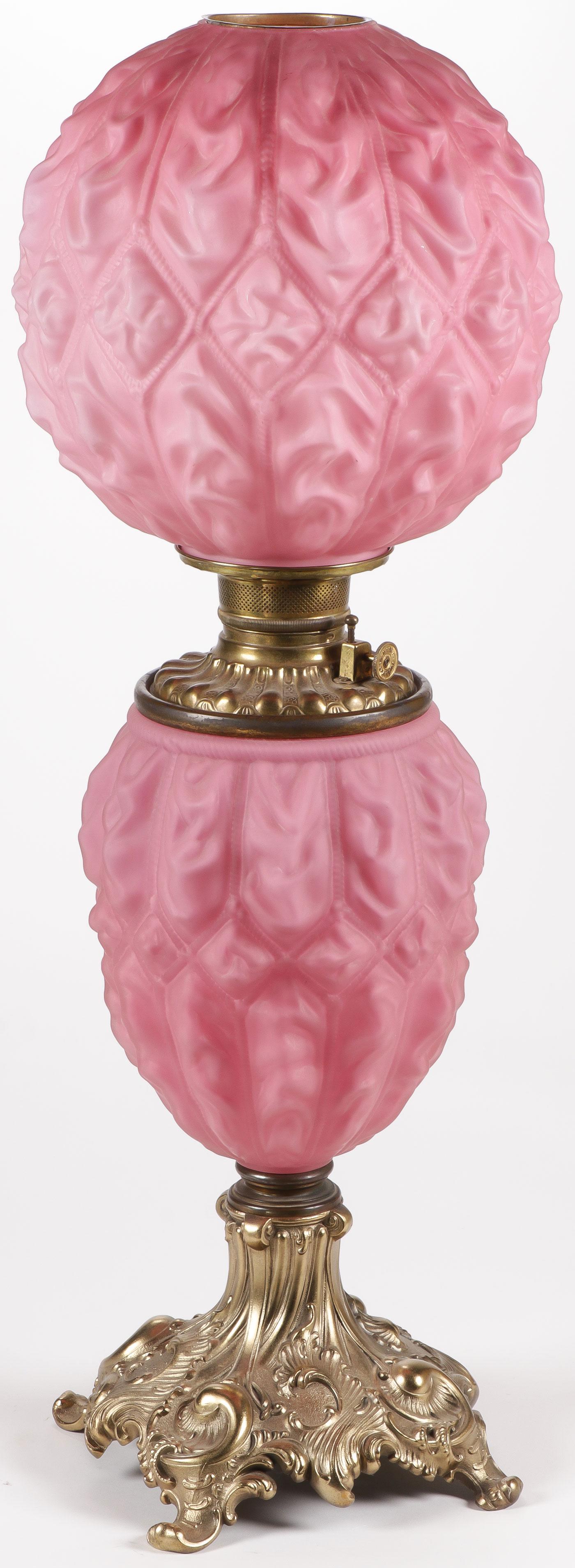 BEAUTIFUL CONSOLIDATED KEROSENE PARLOR LAMP: BEAUTIFUL CONSOLIDATED KEROSENE PARLOR LAMP. Featuring cased pink satin glass in the "Imperial" or diamond drape pattern. Not electrified. Height 29.75 inches. SHIPPING NOTICE: Jackson's is your sole