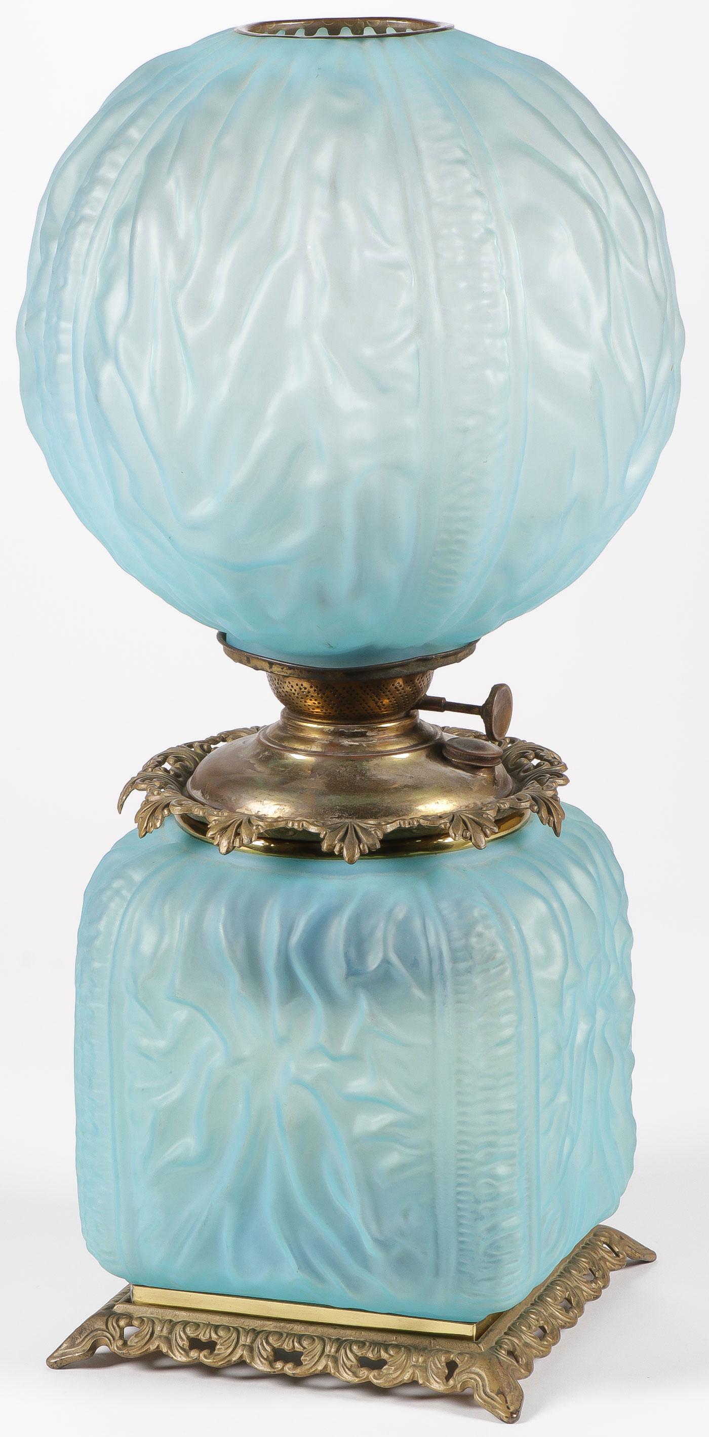 FINE PITTSBURGH SQUARE BASE PARLOR LAMP: FINE PITTSBURGH SQUARE BASE PARLOR LAMP. In rare blue satin glass in drape pattern. Not electrified. Height 22 inches.SHIPPING NOTICE:Jackson's is your sole and only source for one stop packing and