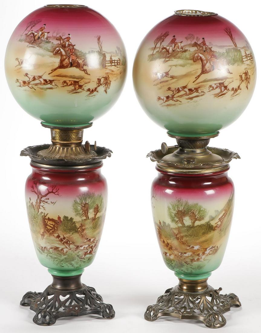 PR GREAT HUNT SCENE GWTW PARLOR LAMPS: PR GREAT HUNT SCENE GWTW PARLOR LAMPS. Comprising a pair of parlor lamps, the globe and base with transfer decorated English fox hunt scenes. One electrified, one not. Height 26 inches. SHIPPING NOTIC
