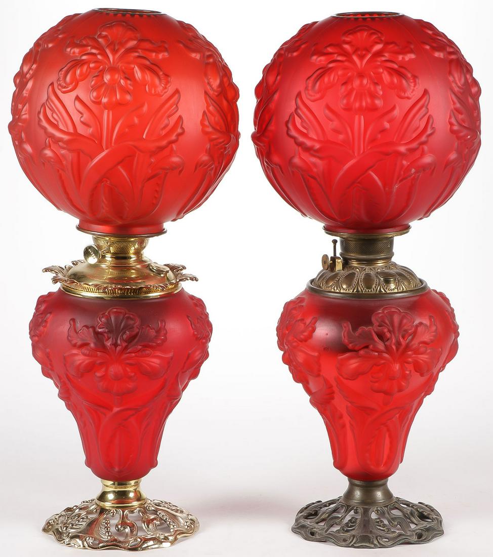 PAIR OF RED SATIN PARLOR LAMPS: PAIR OF RED SATIN PARLOR LAMPS. Each in Regal Iris pattern, each 26 inches. SHIPPING NOTICE: Jackson's is your sole and only source for one stop packing and shipping. With over 50 years of experience,