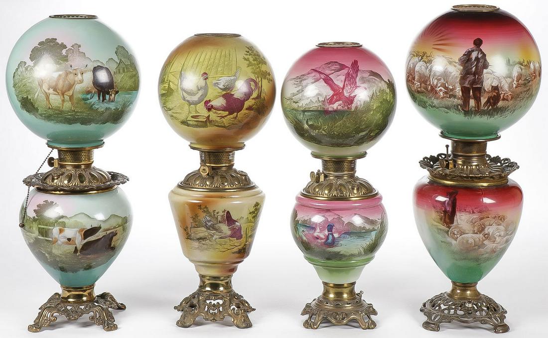FOUR RARE FARM SCENE PARLOR LAMPS: FOUR RARE FARM SCENE PARLOR LAMPS. Comprising four rare unique parlor lamps, each with matching globe and base; the largest with shepherd and shepherdess at dusk, one with watering cows, another with 